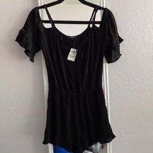 Charlotte Russe black cold shoulder romper. Size small.